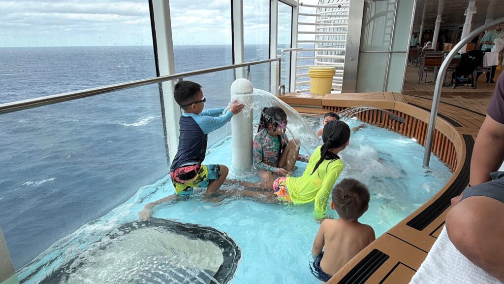 Kids at the kiddie pool on a Disney cruise ship sea day."